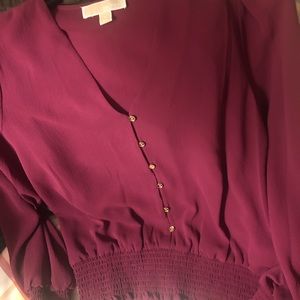 Almost new smocked waist long sleeves top